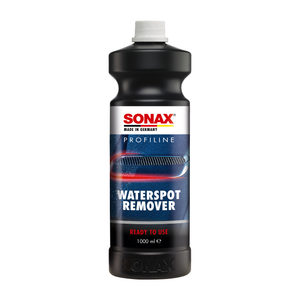 1L Flasche des SONAX Profiline WaterSpot Remover, ideal zur Entfernung von hartnäckigen Wasserflecken auf Lack- und Glasoberflächen